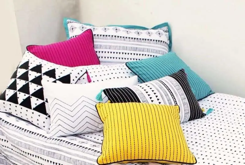 Cotton white pillow with aztec zig zag embroidery